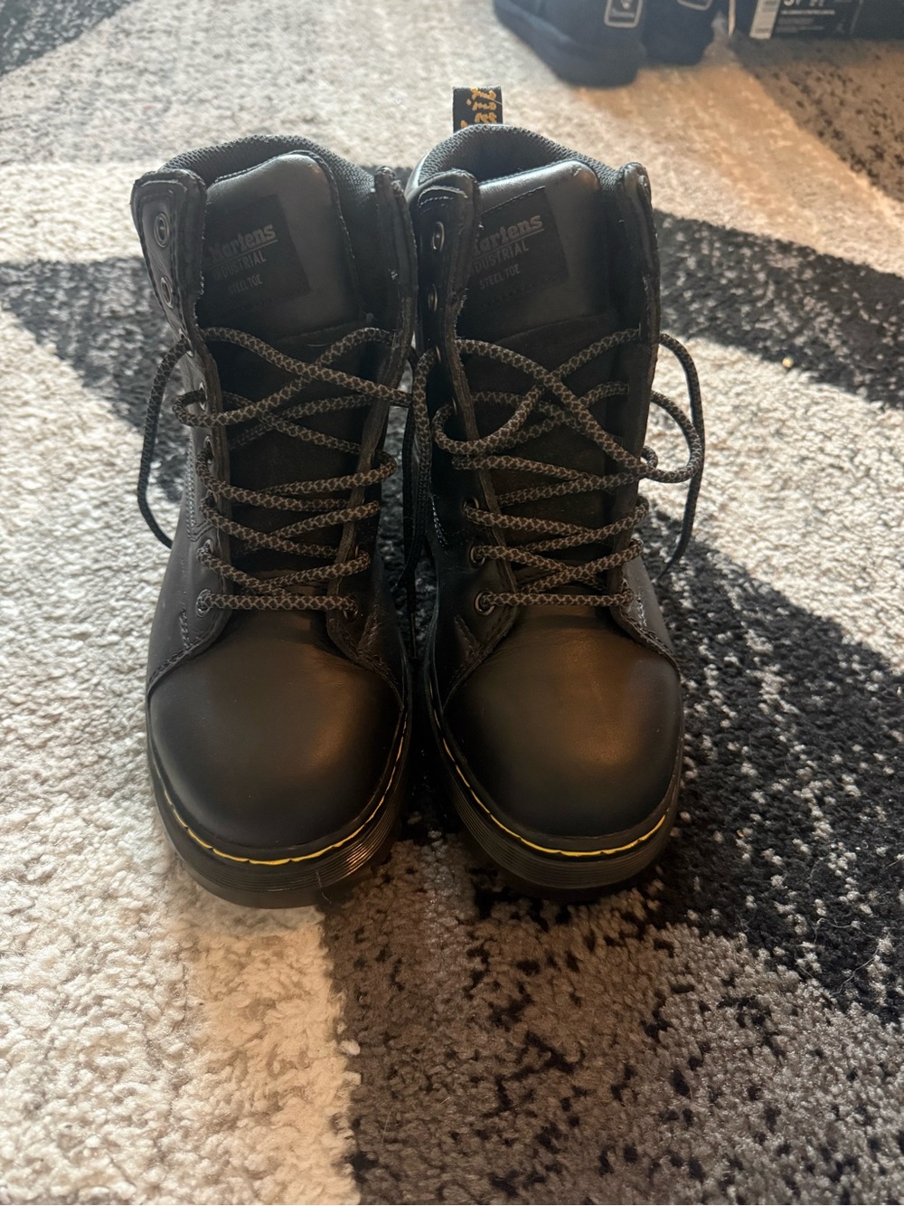 Dr. Martens Black Leather Lace-Up Boots with Yellow Welt Stitching